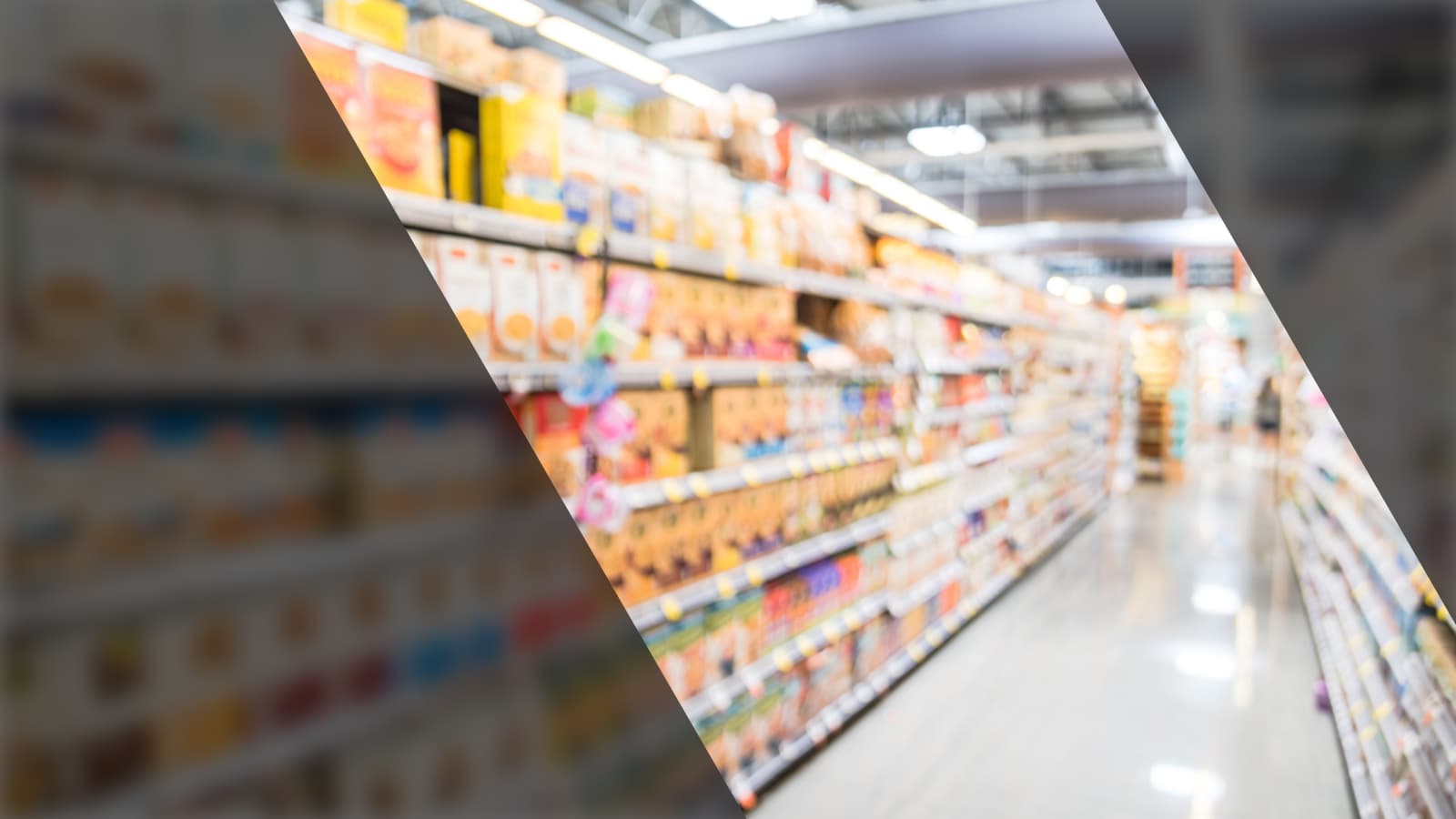 A colorful grocery store aisle displaying shelves filled with an assortment of food items, inviting customers to explore.